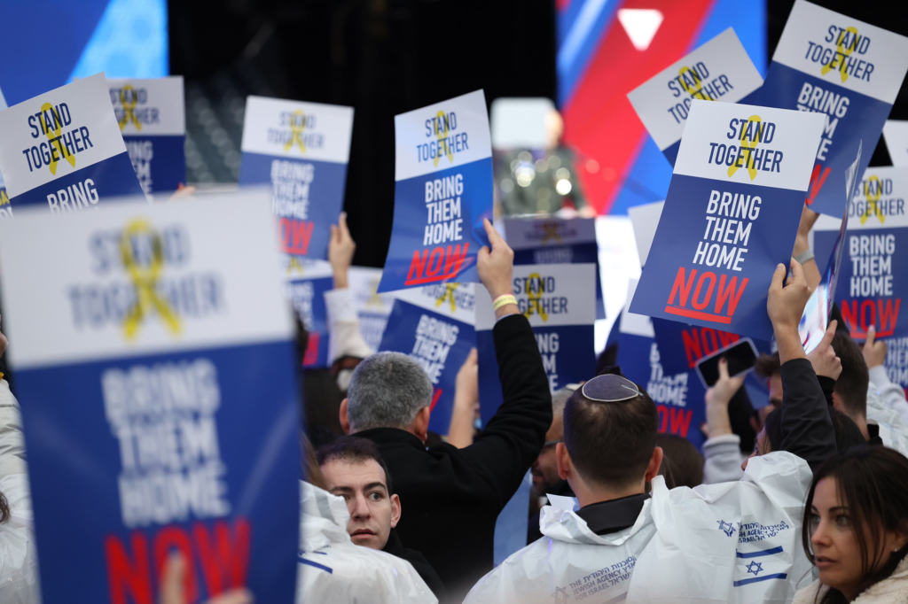 people holding signs